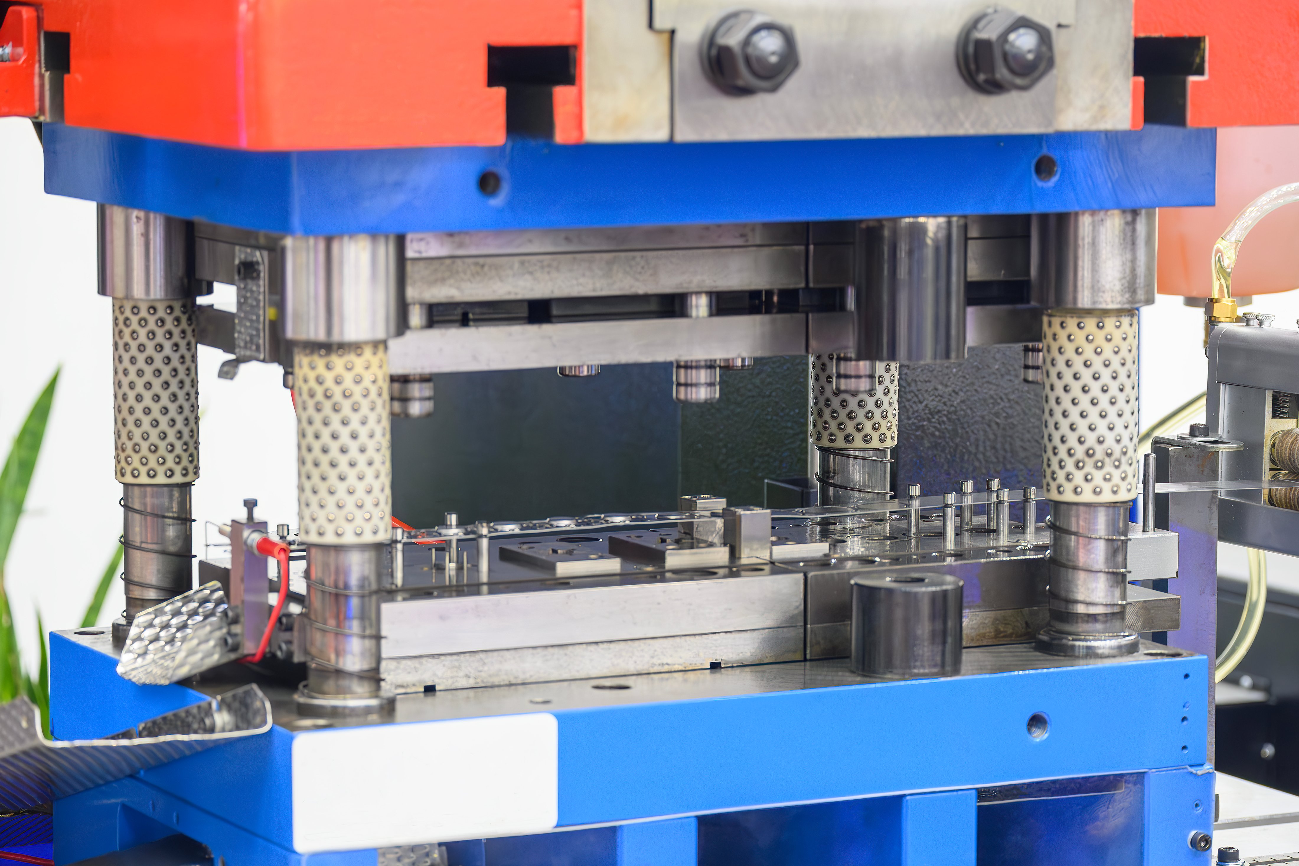 blue and orange hydraulic press